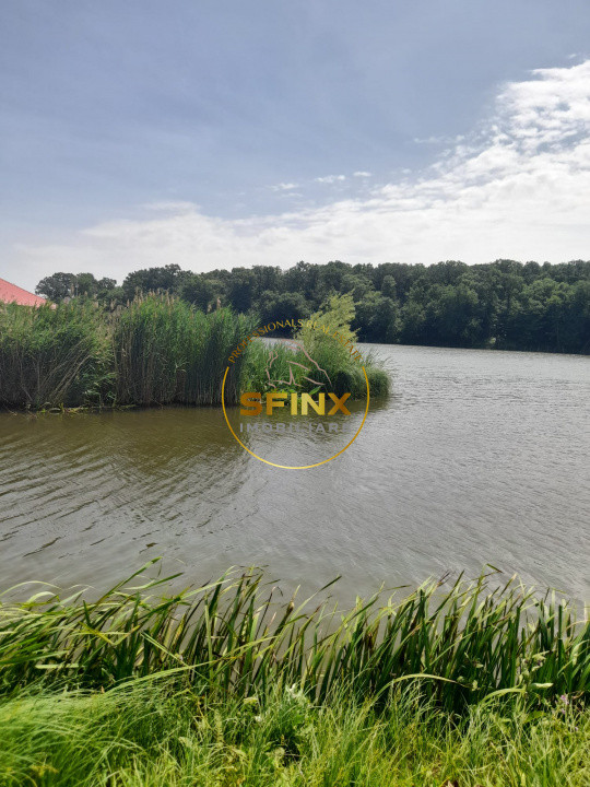 Teren cu autorizatie 3 case Caldarusani lac/padure 2700 mp, 85 ml deschidere DJ