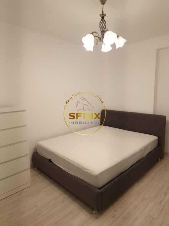 Apartament 3 camere 74 mp cu loc de parcare