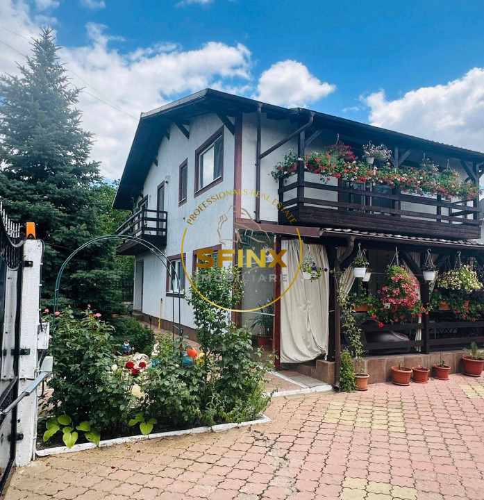 5 camere, 4 locuri parcare in garaj-vila cocheta Balotesti 