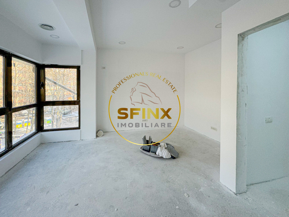 Cladire S+P+E+M 380mp + curte 120mp - zona Titan