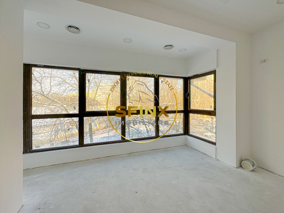 Cladire S+P+E+M 380mp + curte 120mp - zona Titan