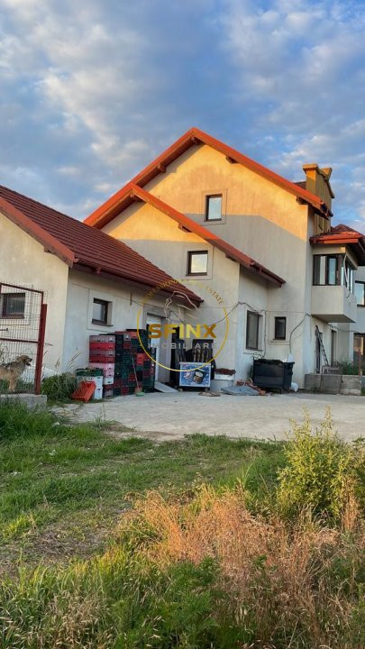 Casa la rosu cu teren 1973 mp Domnesti
