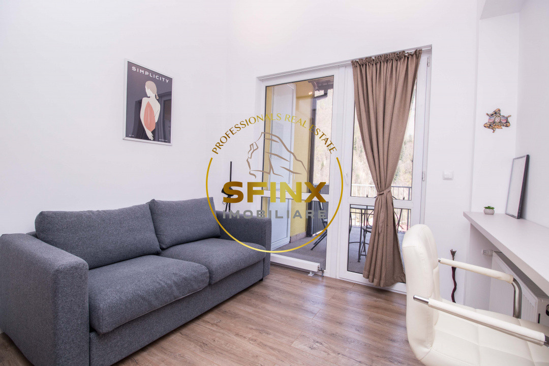 Apartament cu scara interioara + loc de parcare inclus de vanzare in Sinaia 