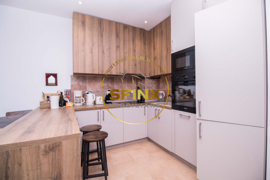 Apartament cu scara interioara + loc de parcare inclus de vanzare in Sinaia 