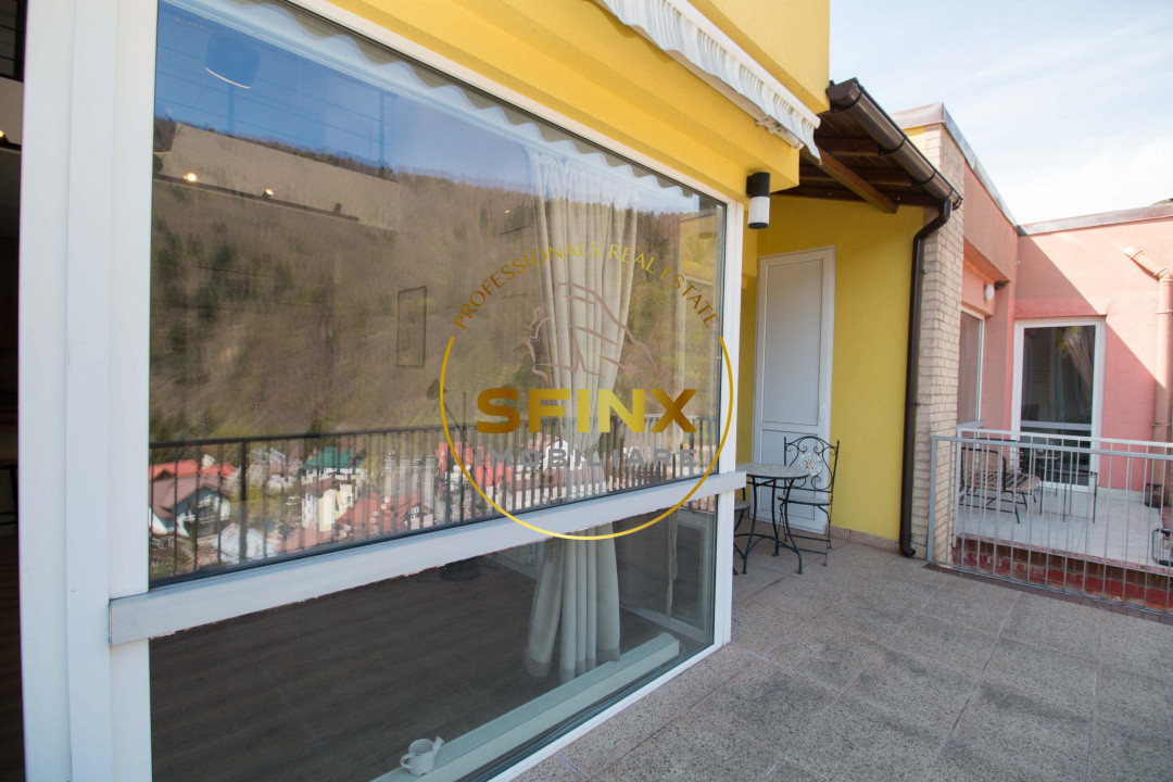 Apartament cu scara interioara + loc de parcare inclus de vanzare in Sinaia 