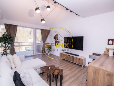 Apartament cu scara interioara + loc de parcare inclus de vanzare in Sinaia 